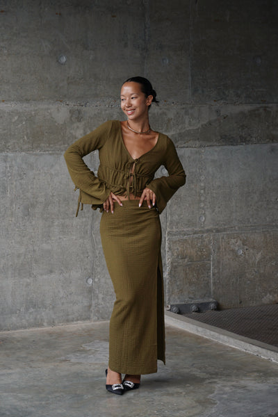 Olive Green flowy maxi skirt set styled for a sophisticated evening look